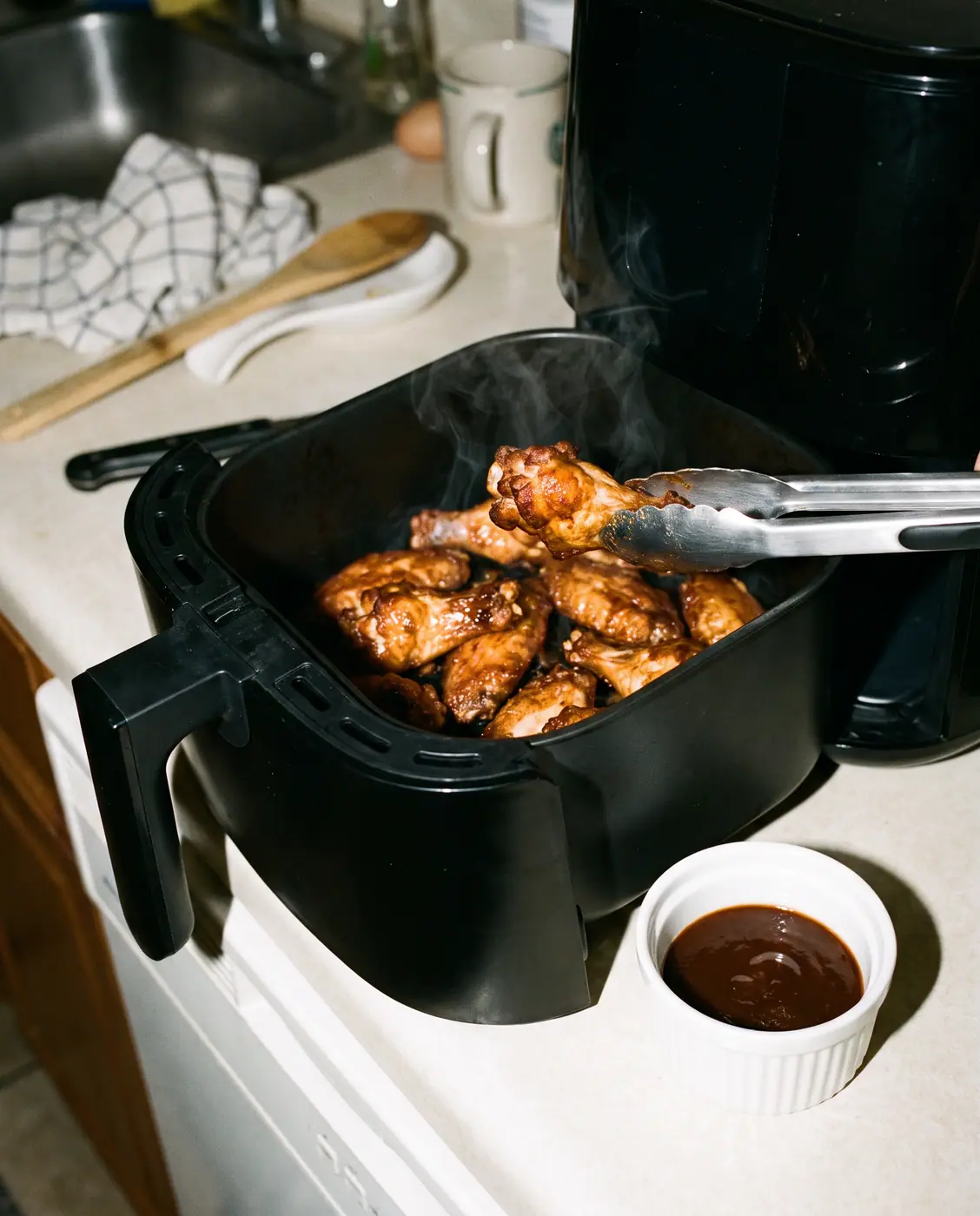 Chicken wings air fryer crispy food kitchen steam tongs