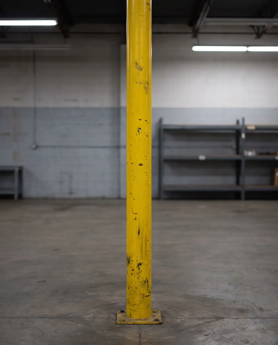 Yellow safety pole indoor compliance workplace safety