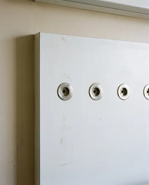 Medical gas outlets hospital bedhead panel white wall ward