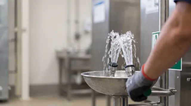 Emergency eyewash drench equipment weekly flow test water arcing