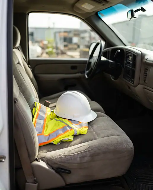 Hi-vis vest hard hat pickup truck passenger seat safety work